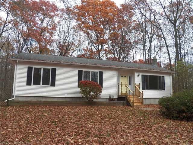 Exterior Front. Country setting for this large ran