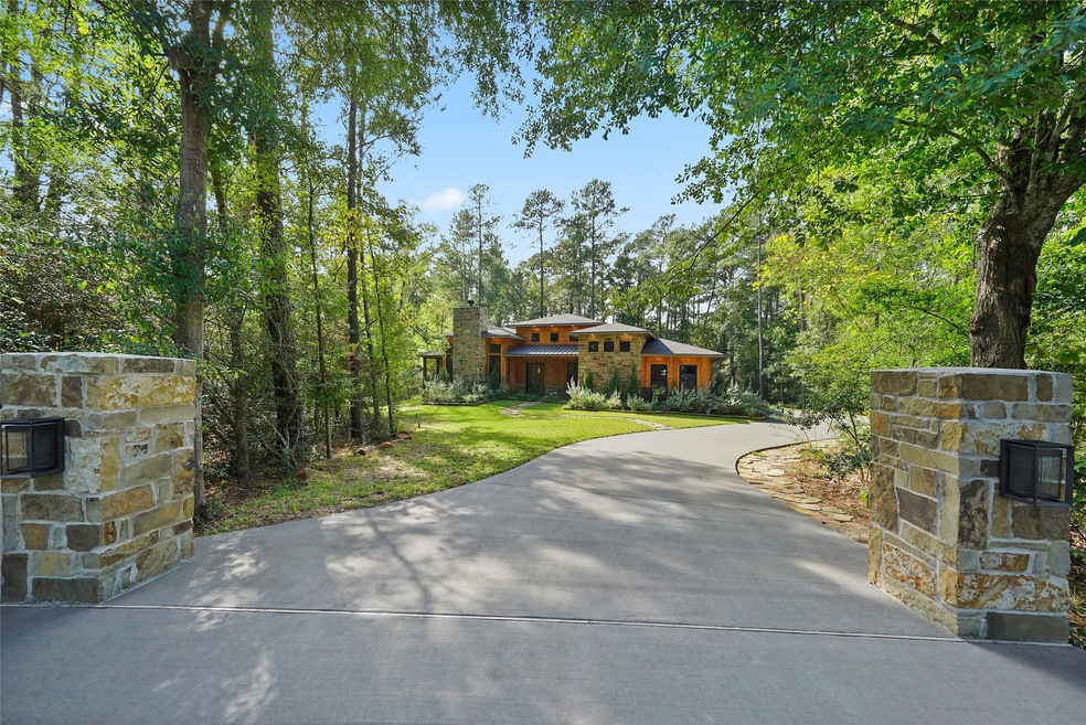 Just built in 2020 with breathtaking results. Natural color pallet of cedar & stone blend into its 1 Acre setting as if it grew up from the ground with the beautiful majestic trees that surround it.