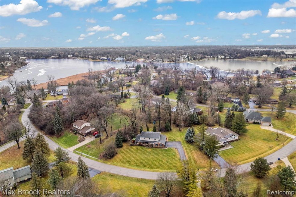 Ariel view of home and lake.