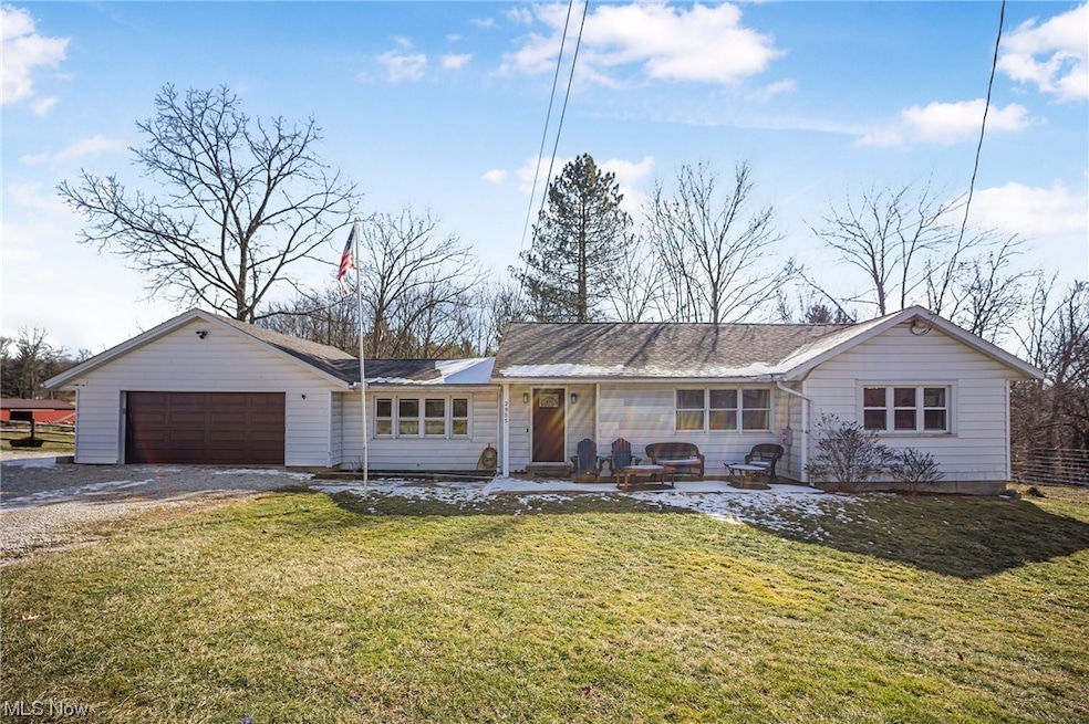 Ranch-style house with a front lawn