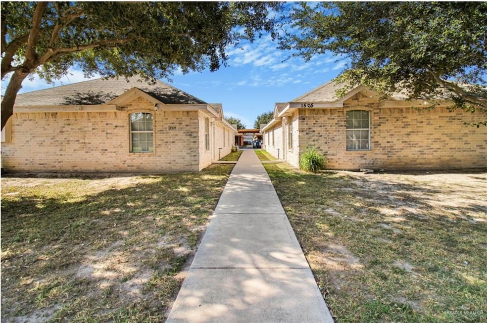 View of property exterior with a lawn