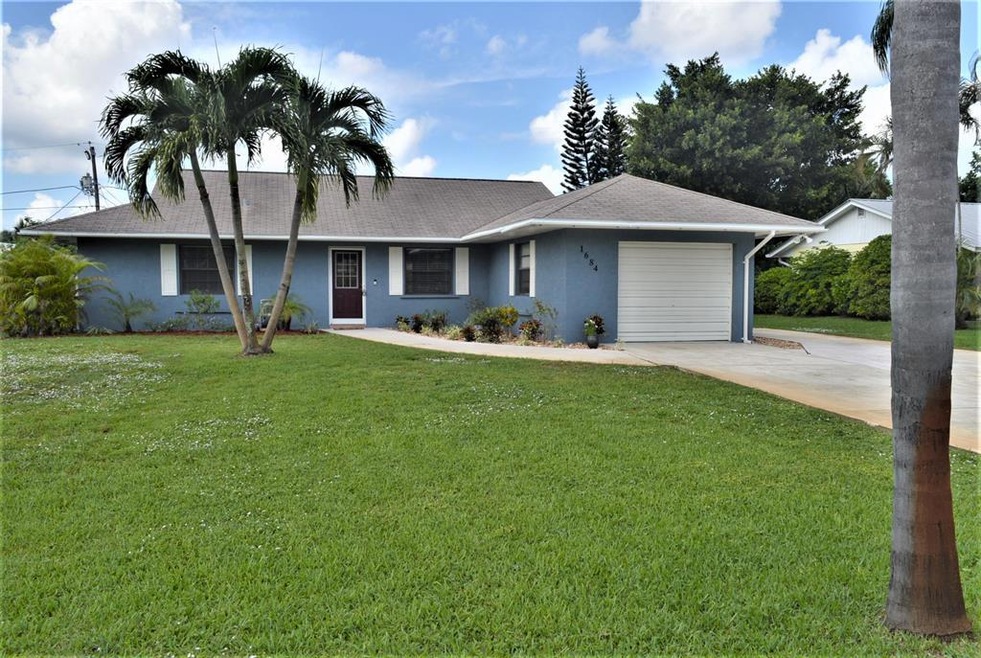 1684 NE Silvia Ave, Jensen Beach, FL 34957 - photo 1