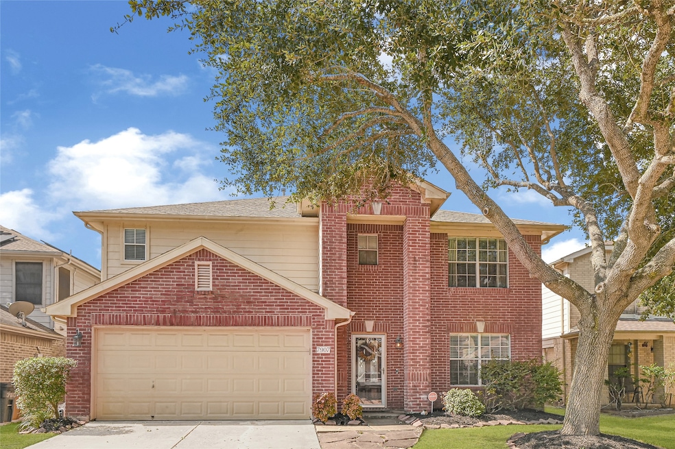 Charming brick home featuring a stunning grand entrance.