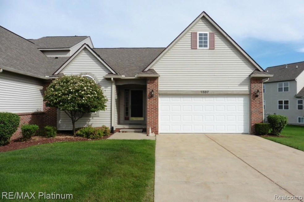 1587 Myrica Ln unit 13, Howell, MI 48855 - photo 1