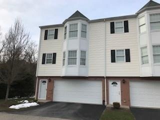 LARGE END UNIT WITH 2 CAR INTEGRAL GARAGE