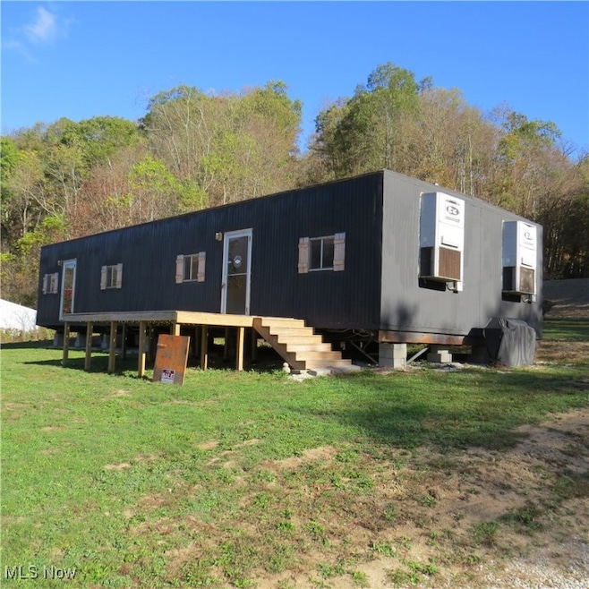 1054 Bergholz Rd SE unit 24C, Bergholz, OH 43908 - photo 1