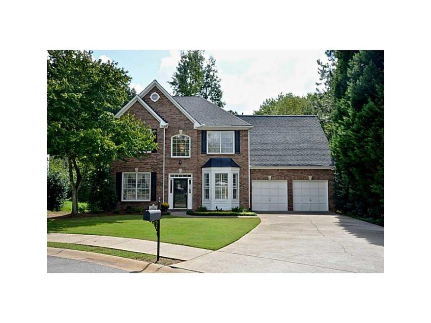 Exterior Front. Outstanding 3 BR/3.5 BA Brick Beau