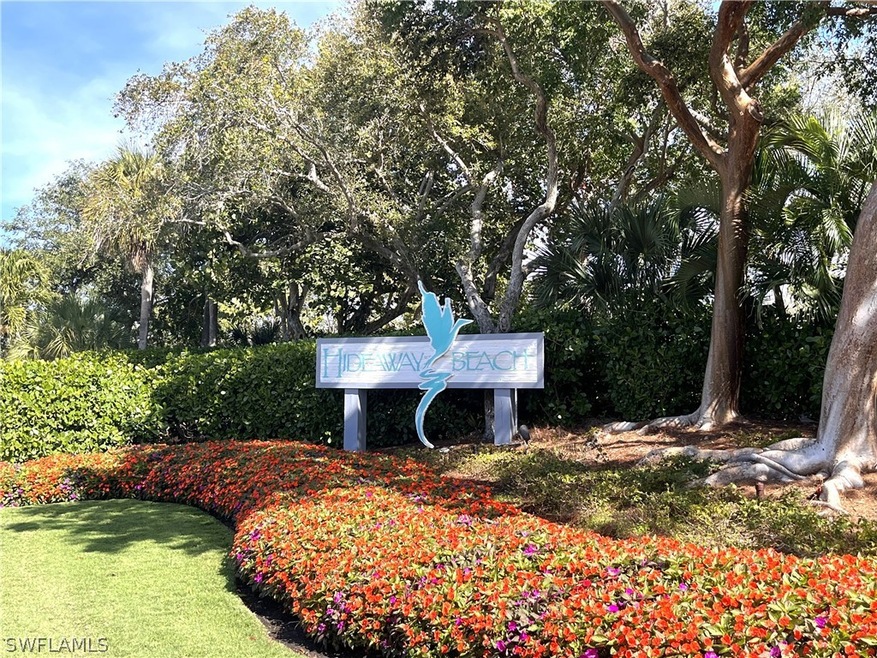View of property's community featuring a yard