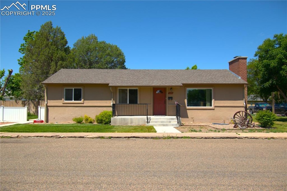 Ranch-style home featuring stucco siding
