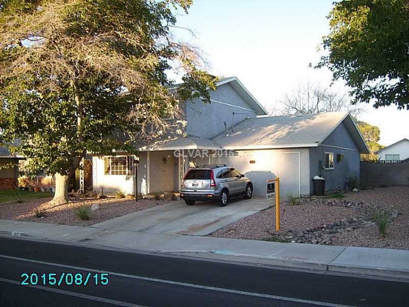 Facade/Exterior Front. Front of the home with RV/S