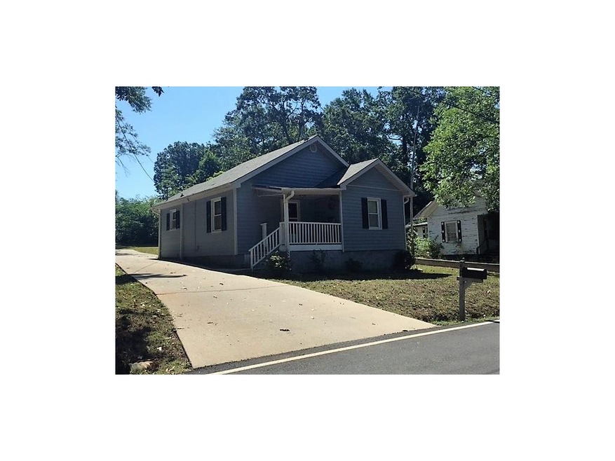Cute as a button Cottage with front porch!