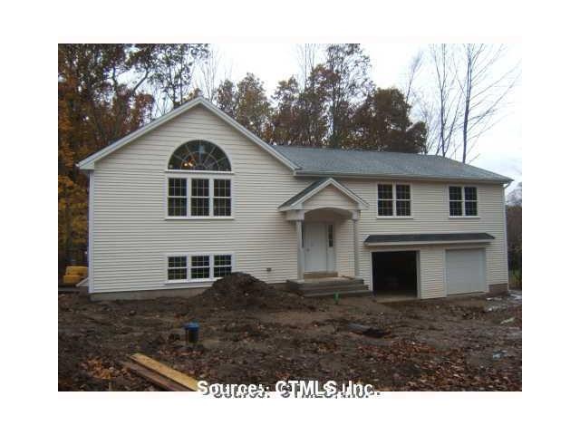 Exterior Front. This contempory bilevel will knock