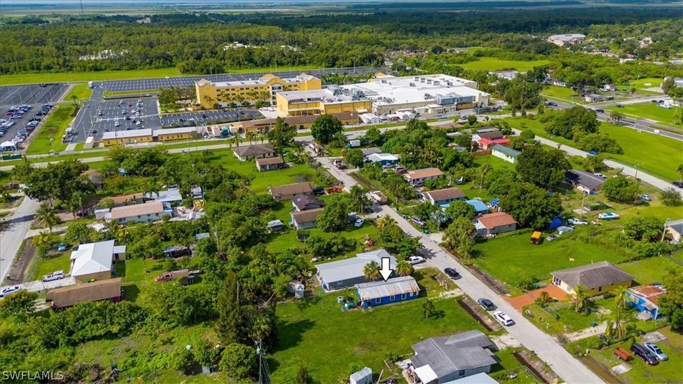 Aerial view of property and town