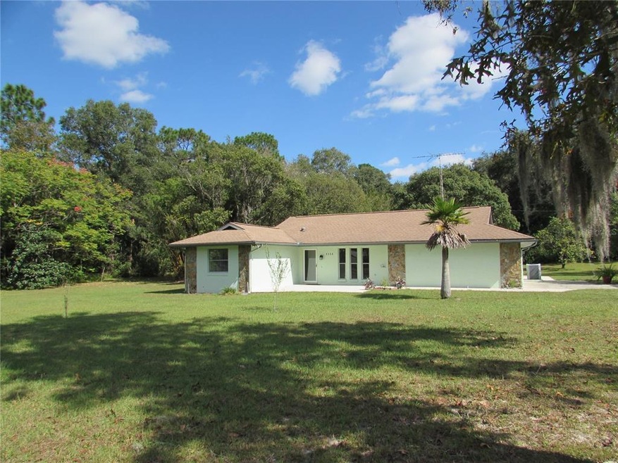 Beautiful home on private acre lot in the Woodland