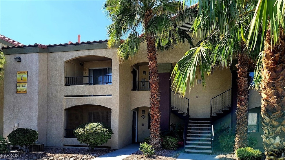 View of front of house featuring stucco siding, st