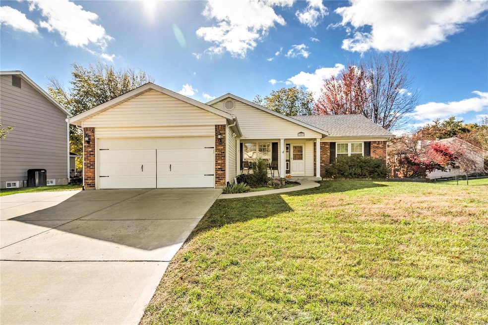 Spacious two car garage along with a covered front porch