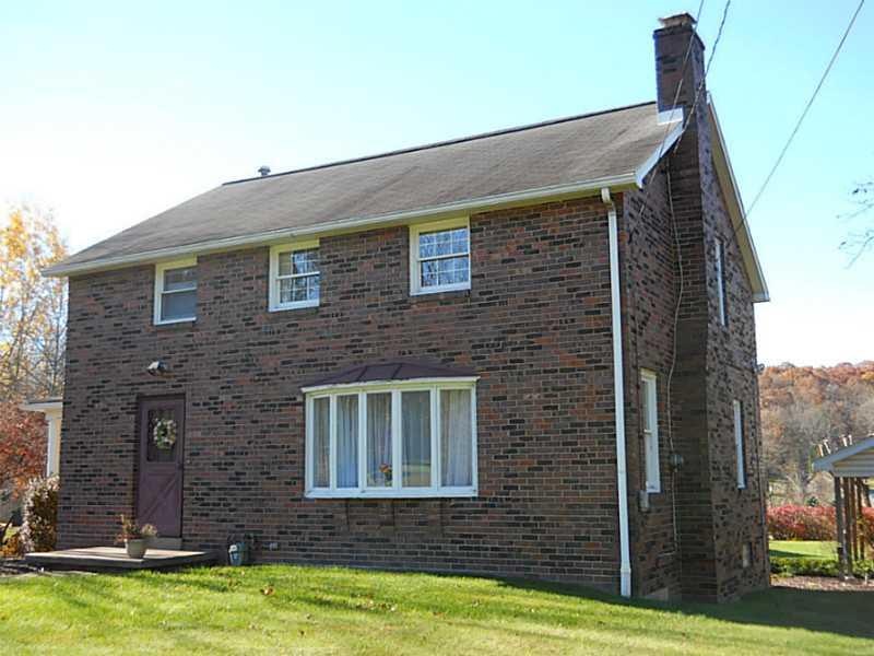 Exterior Front. Custom brick home. One owner.  Imp