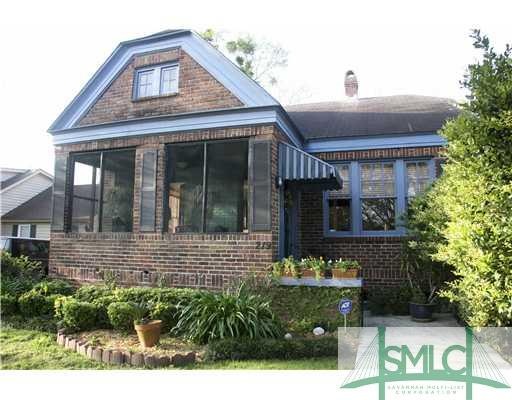 Exterior Front. Fantastic screened in porch. The t