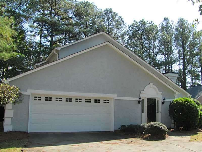 Exterior Front. FOUR SIDED HARDCOAT STUCCO