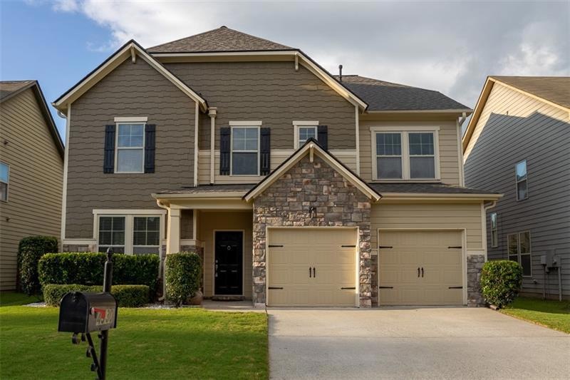 Beautiful stone and concrete siding.  Siding has n