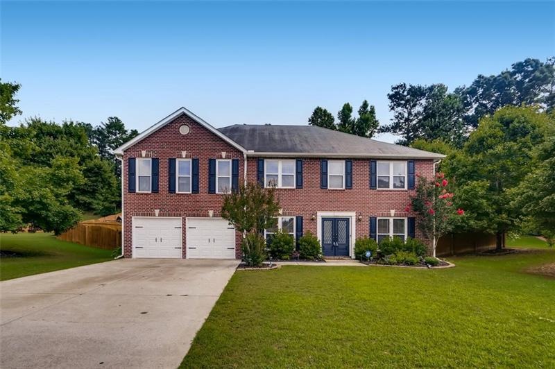 Welcome to 6434 Woodlore Trail, Acworth.  In The E