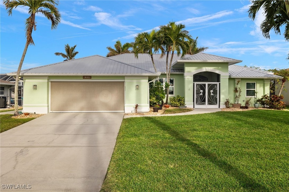 Single story home featuring stucco siding, drivewa