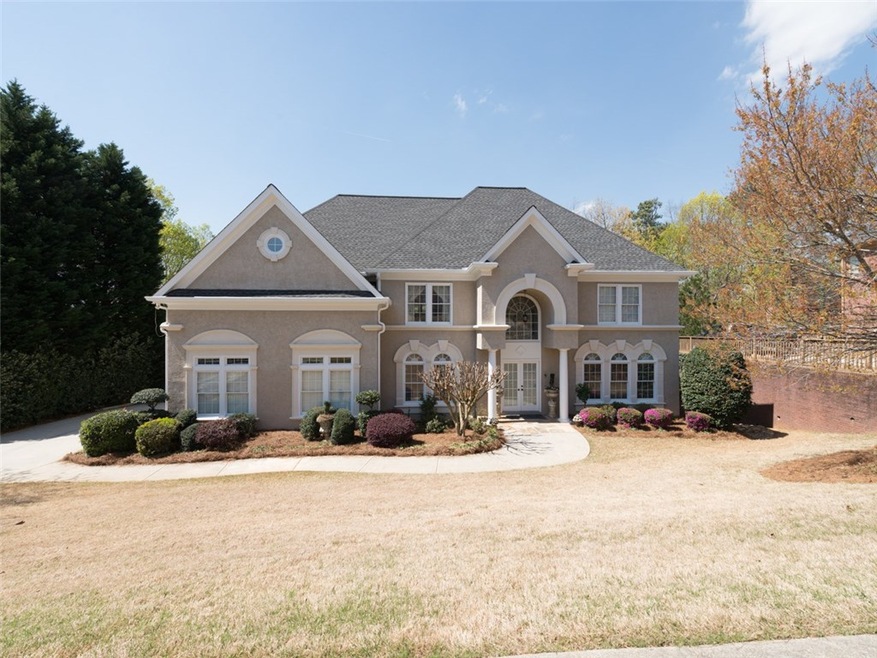 Recently renovated hardcoat stucco home on large l