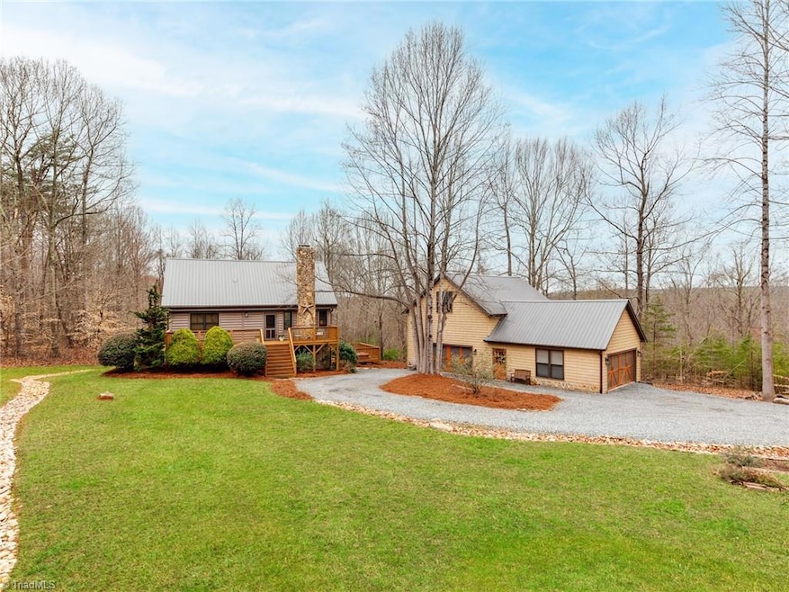 Front view of home and garage with beautiful views