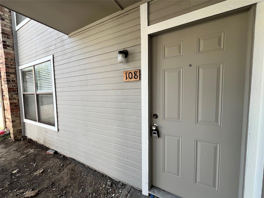 Here is the front entrance featuring an accented address number label.