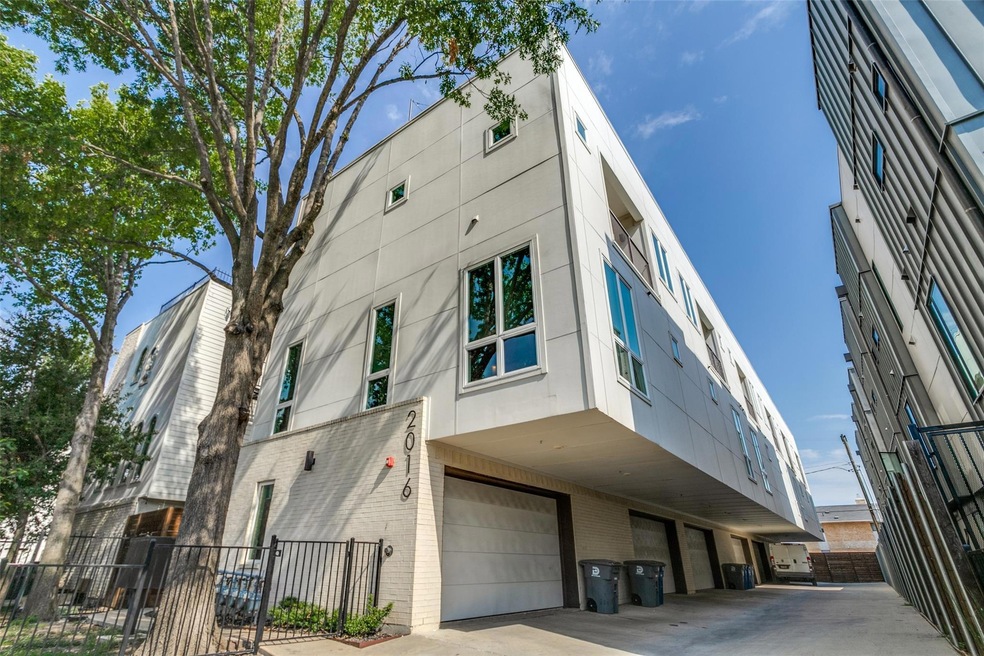View of building exterior with a garage