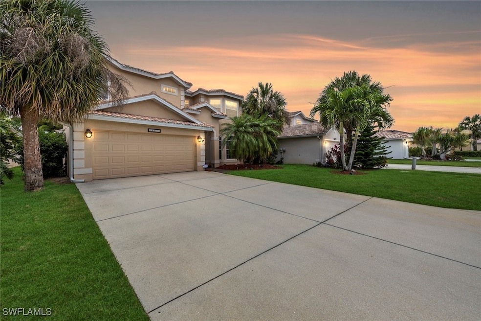 View of front of home featuring concrete driveway,