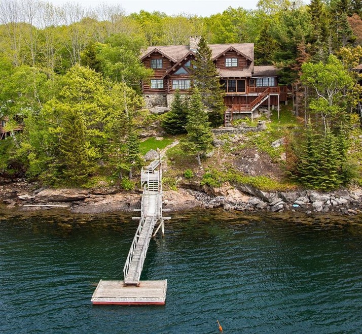 Aerial view of this custom log home...
