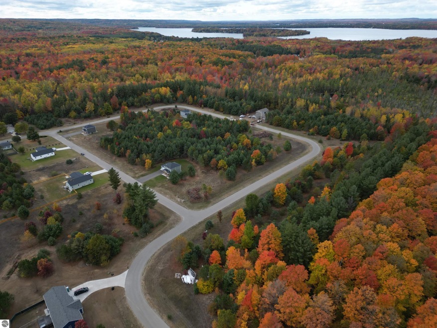 6483 Jeffrey Place unit Lot 23, Grawn, MI 49637 - photo 1