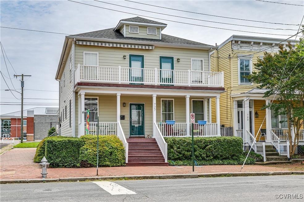 View of front of house featuring covered porch, a