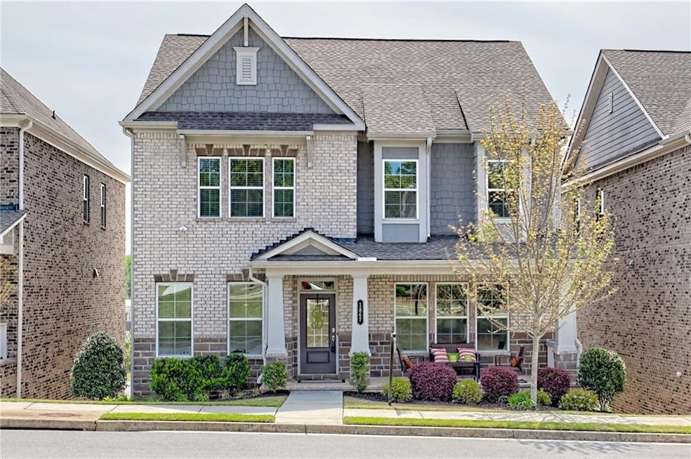 Craftsman-style house featuring a porch, roof with