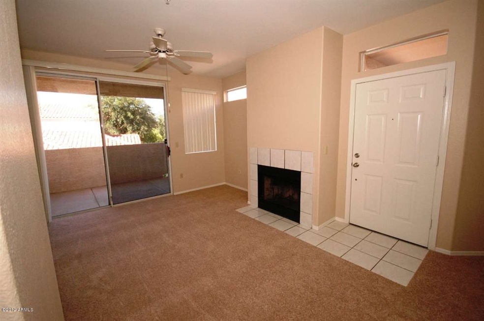 GREAT ROOM W/ FIREPLACE AND BALCONY