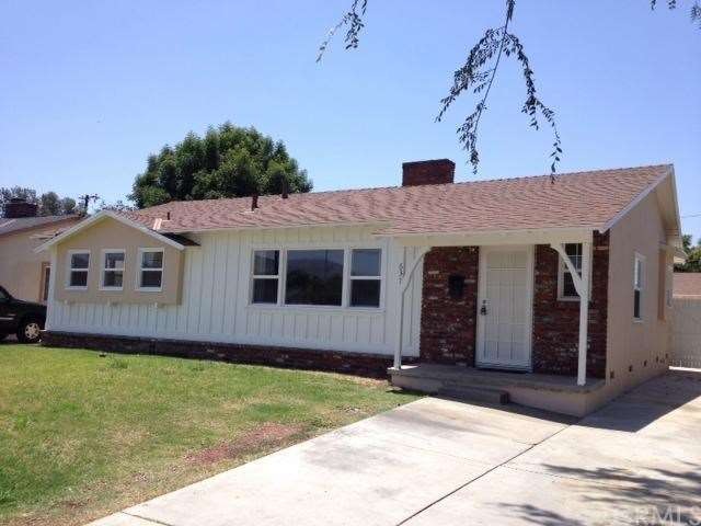 This home has been completely refurbished.  New floors, new windows, new paint in nd out, new kitchen, nw garage door and plenty of room for parking.