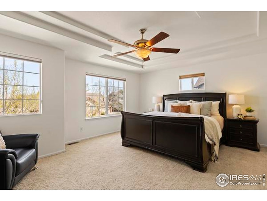 Double doors open to your luxurious primary suite complete with tray ceilings and a serene 5 piece ensuite with two walk-in closets.