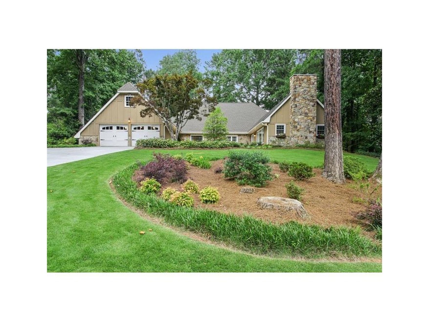 Fabulous cottage-style home in popular Swim/Tennis