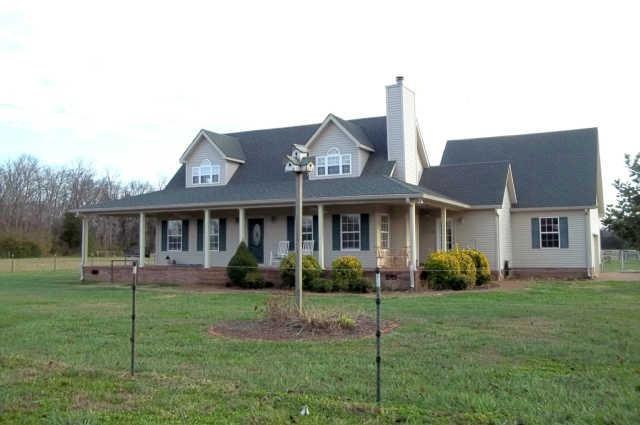 Attractive home on 27  acres. If you love horses, you will love this property!