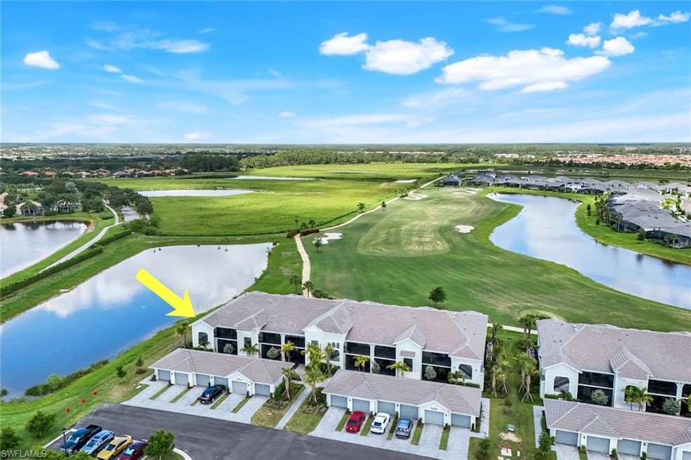 Aerial view of a large body of water and a local golf course