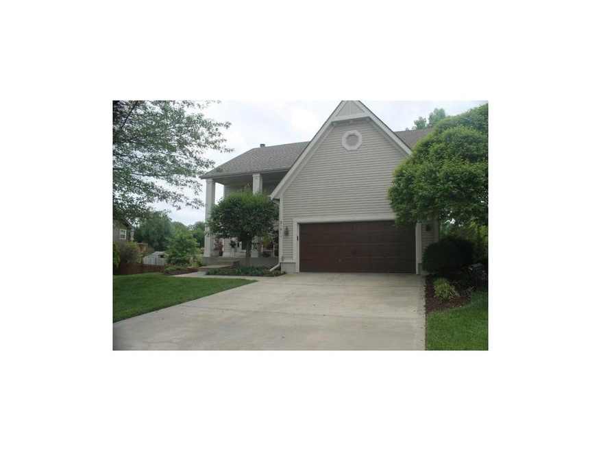 Front with new garage door