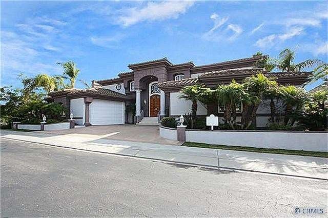 Front of home - 4 car garage