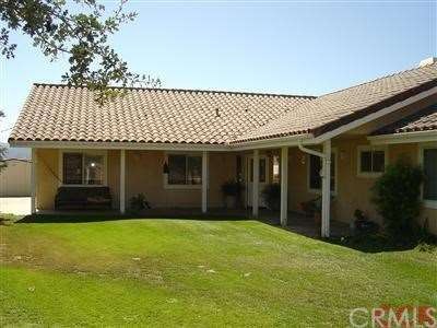 Expansive yard and covered porch.