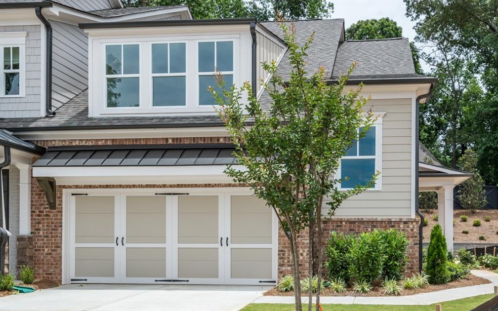 Welcome to your Retreat! Craftsman style at it's best.  Brick Front and Sides with private side entry.  2 Car garage with opener.