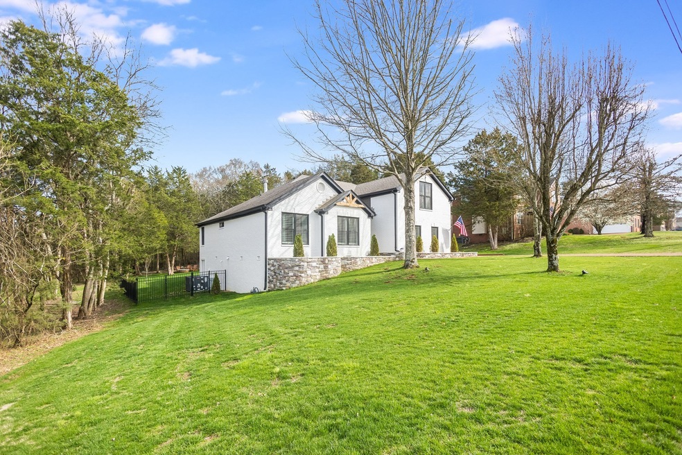 Better than new all brick home on almost a half acre!