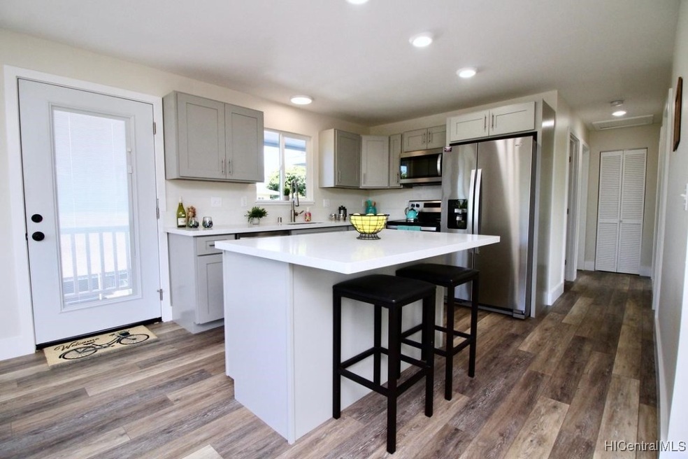Kitchen with Island and lanai access