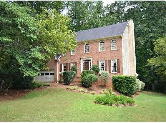 Exterior Front. Wonderful brick home with full bas