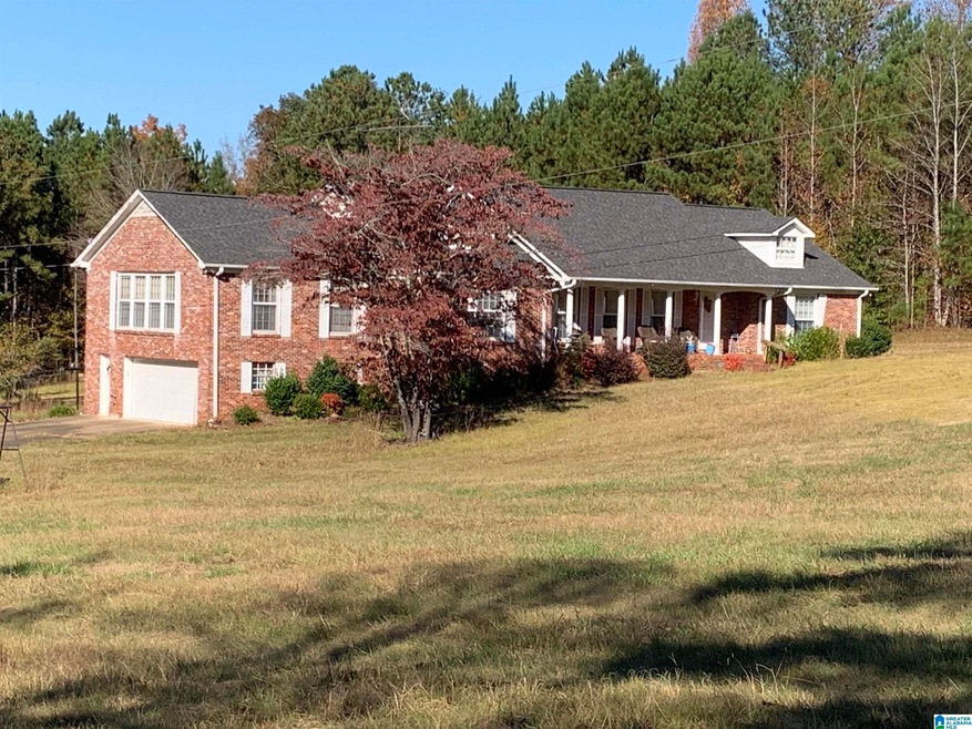 3100' +/- full brick home on a large tract with go