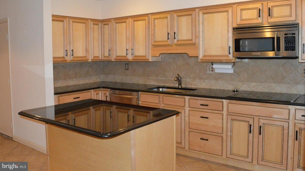 8001 Greenspring Way unit B, Owings Mills, MD 21117 - photo 1